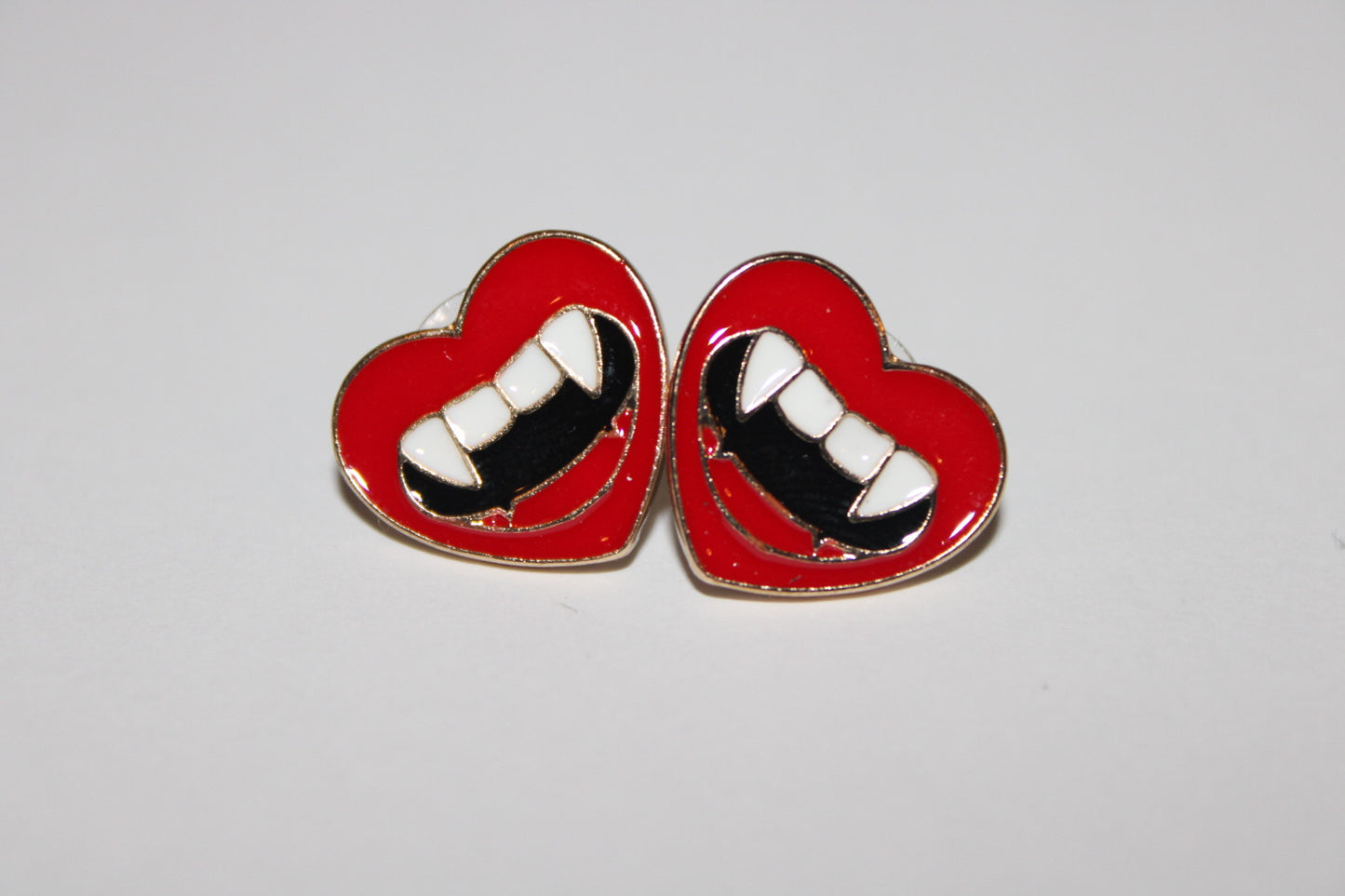 Heart Fang Stud Earrings